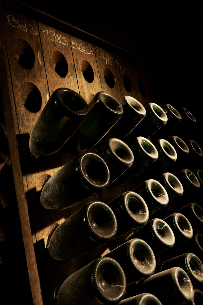 hand riddling of champagne bottles